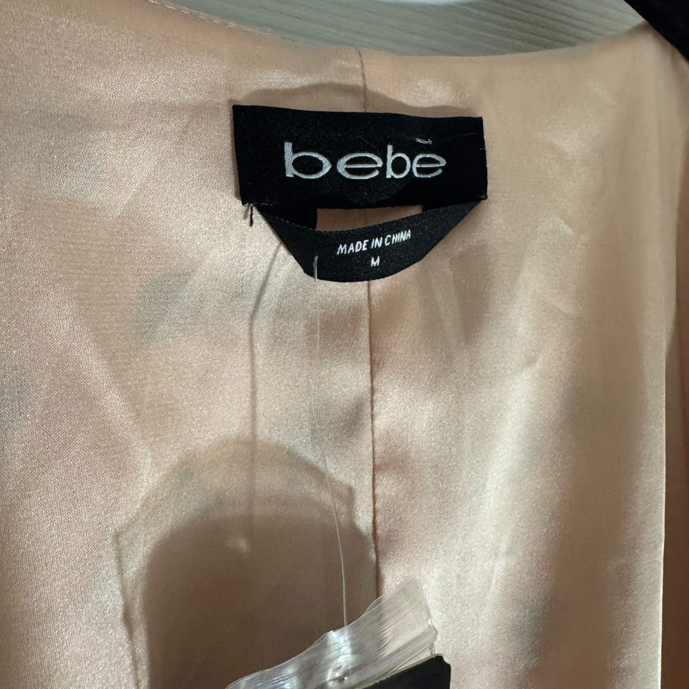 bebe Pink Ruffle V-neck wrap around blouse with sunnies print. NWT. Medium - Picture 4 of 6